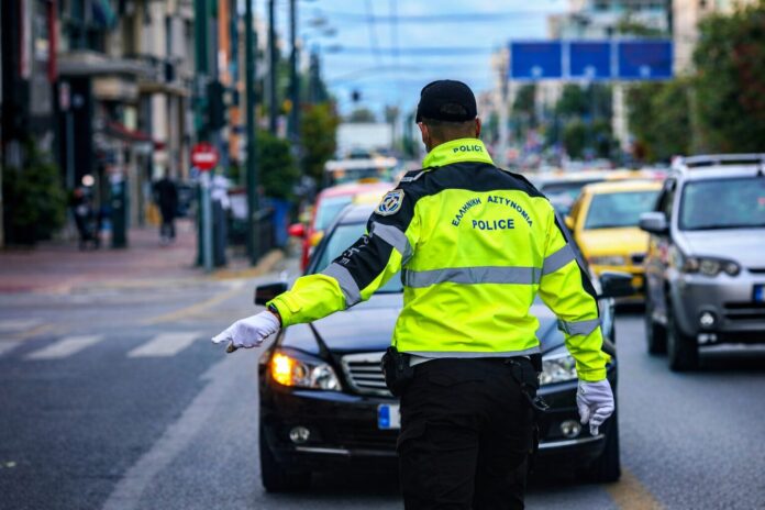 Police officer managing city traffic